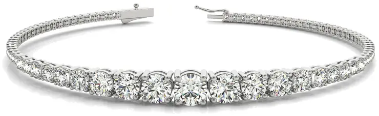 Graduated diamond tennis bracelet with larger diamonds at the center